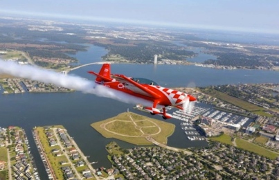 vintage plane, Extra 300L,  flying over the island and Clear Lake / Image by Billy Smith/Hou.Chron.com