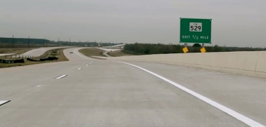 Wide open curving road. EZ tag test on Grand Parkway (Screenshot Hennessey/You tube)