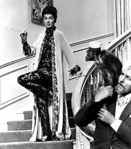 Eccentric woman on stairs. Auntie Mame. Rosalind Russell (Rotten Tomatoes/dharmabumdri)