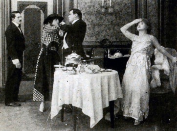 Couples at diner. Woman despairing. Movie still from The Payment/The Moving Picture World/ USPD. artist life, pub.date/Commons.wikimedia.org)