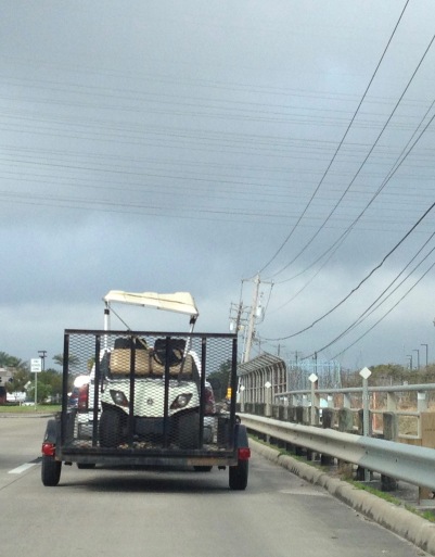 Angry golf cart on bridge (© image: copyrighted, no permissions granted, all rights reserved)