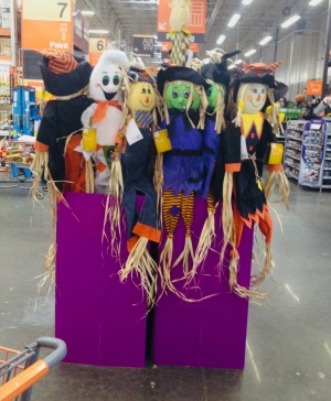 Fall scarecrow Halloween decorations in a box at Home Depot (© image: all rights reserved. Copyrighted, no permissions granted)